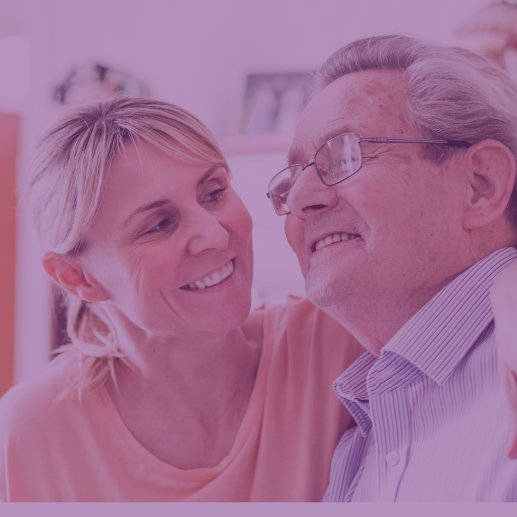 Female carer smiling with male client